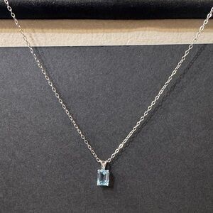 Elegant Silver Necklace with Blue Pendant